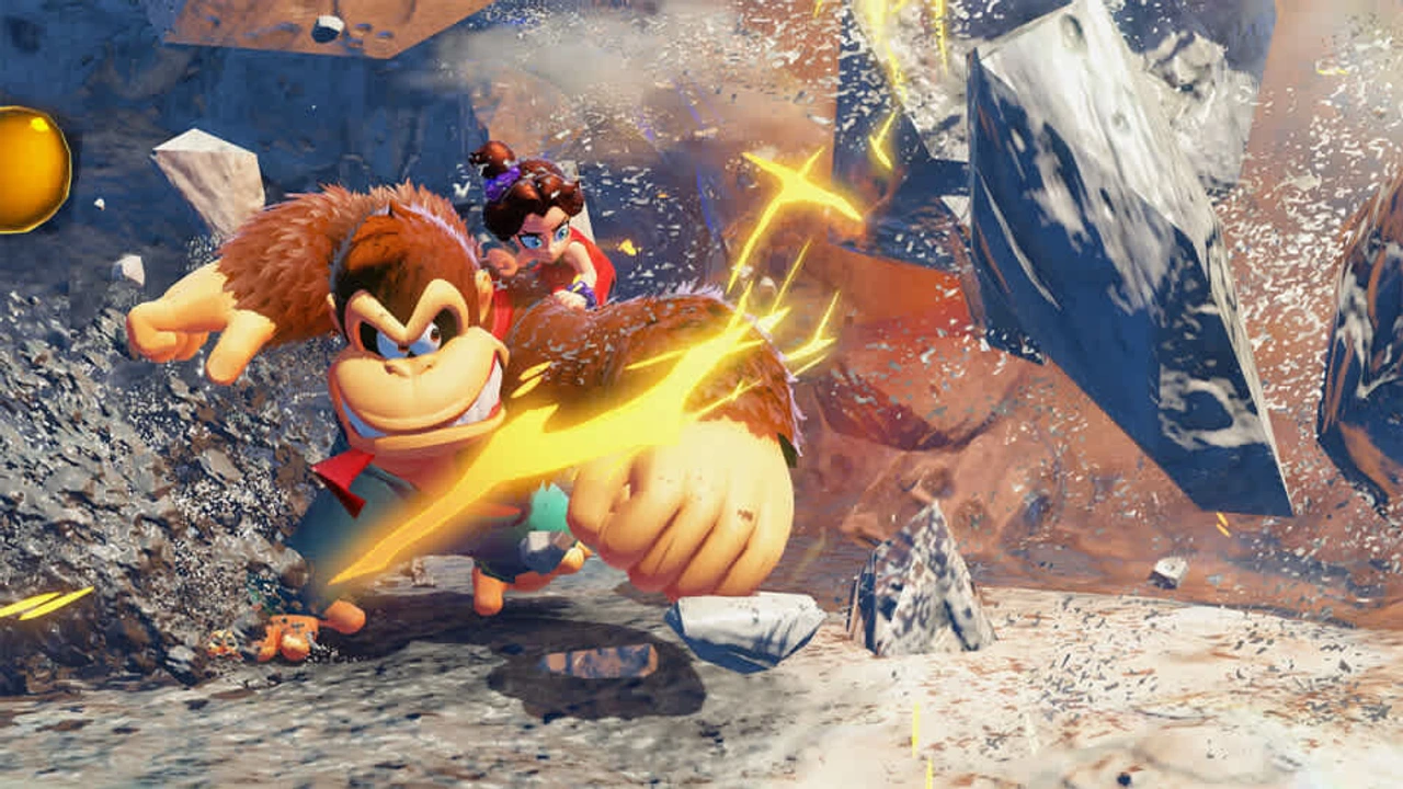 Donkey Kong and Pauline smashing through rock during Donkey Kong Bananza gameplay