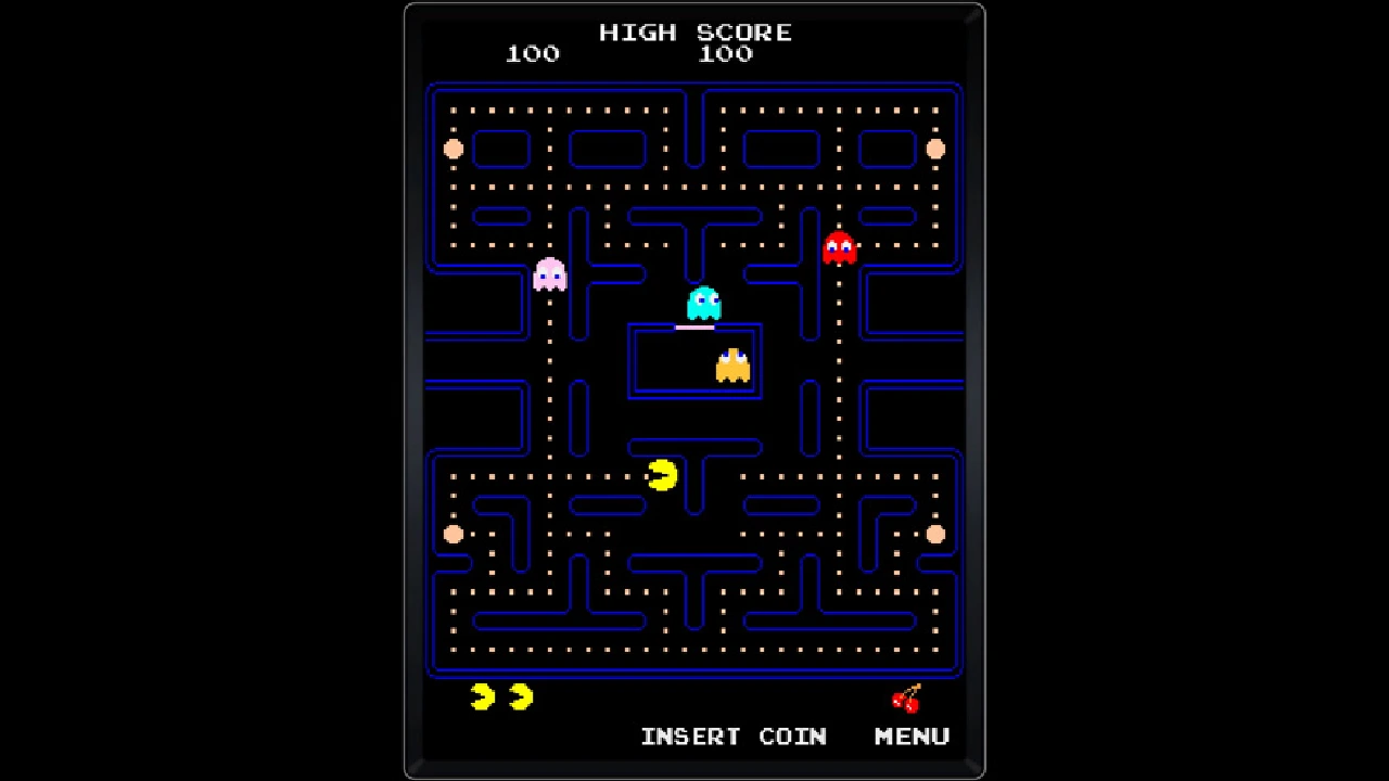 PAC-MAN weaving through the original dot maze as the four ghosts pursue him