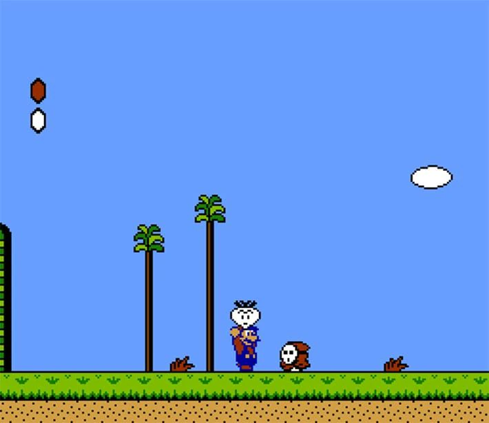 Luigi approaching a Shy Guy in an active side-scrolling Super Mario Bros. 2 stage.