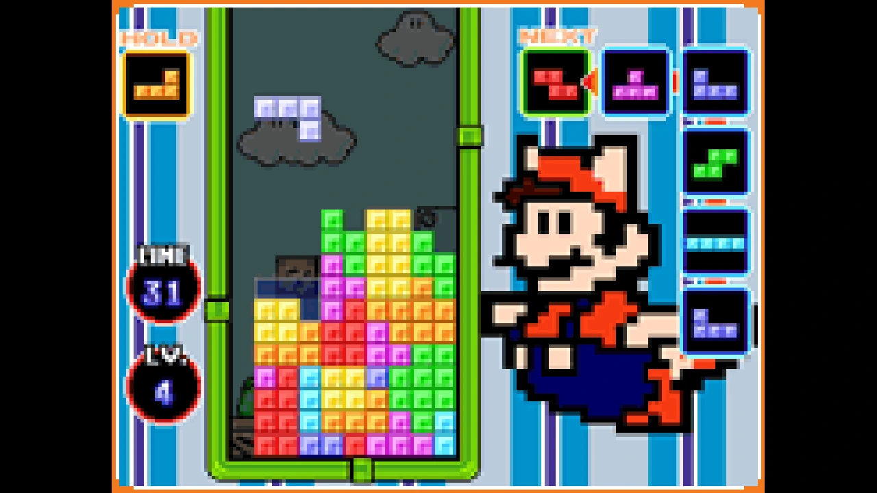 A standard Tetris DS match with a falling piece, next queue, hold panel, and Mario-themed playfield