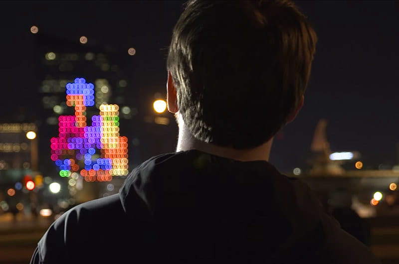 Tetris pieces illuminated across the facade of Philadelphia's Cira Centre